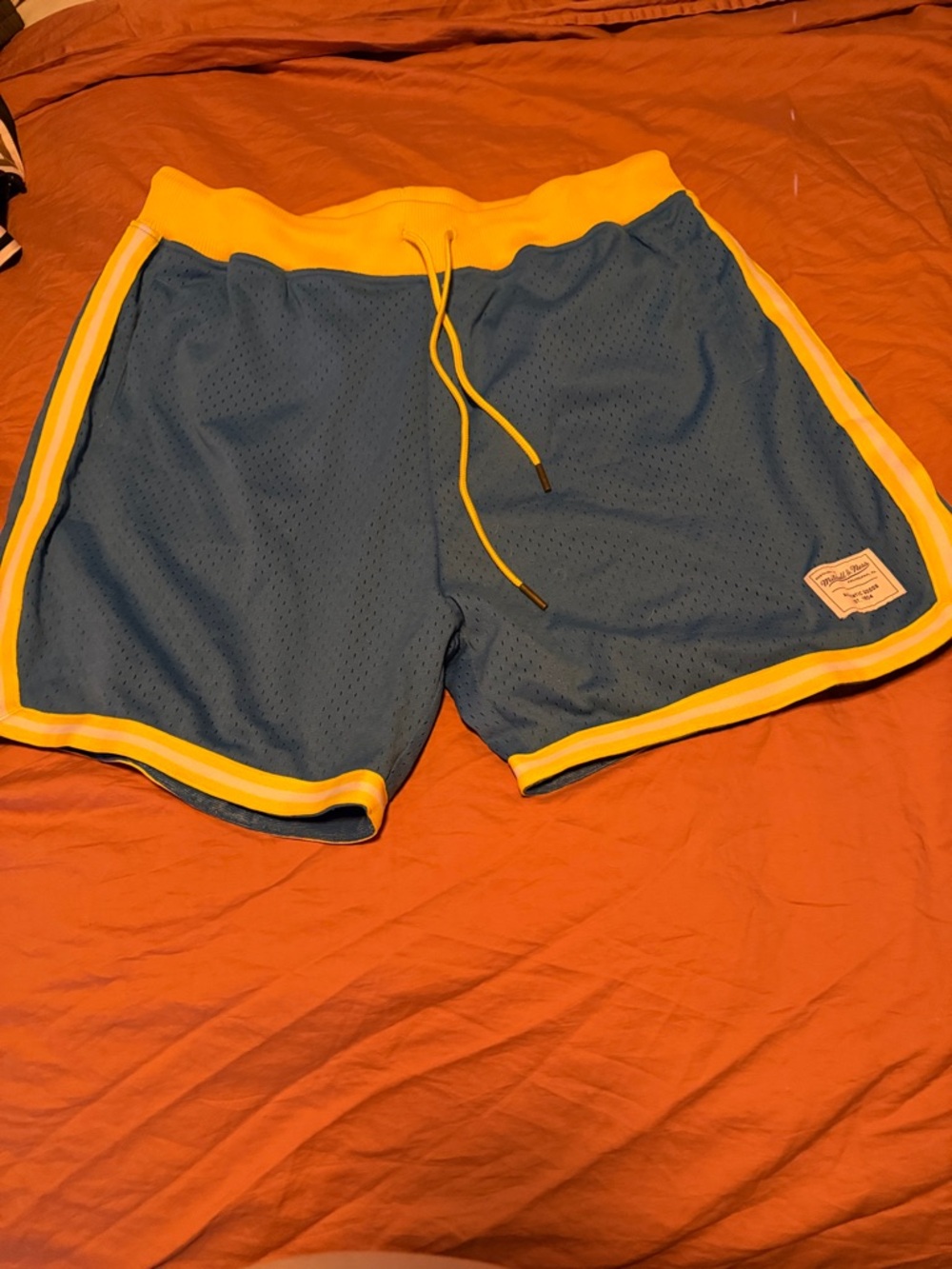 Mitchell & Ness Blue Athletic Mesh Shorts with Yellow Trim